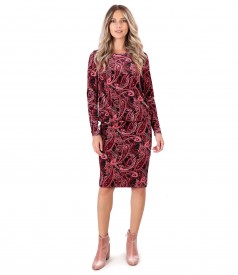 Elegant dress made of velvet printed with paisley motifs