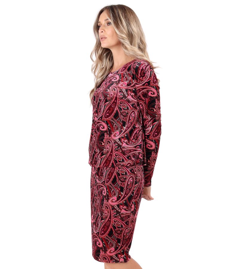 Elegant dress made of velvet printed with paisley motifs
