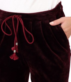 Elastic velvet pants with cuffs at the end