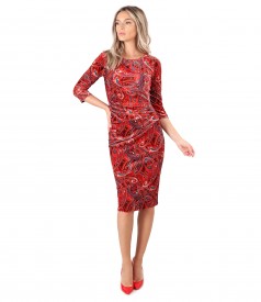 Dress made of elastic velvet printed paisley with folds on the front