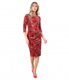 Dress made of elastic velvet printed paisley with folds on the front