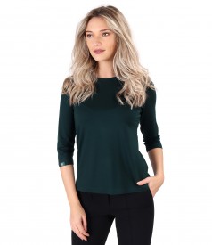 Elastic jersey blouse with rips at the decolletage and sleeve
