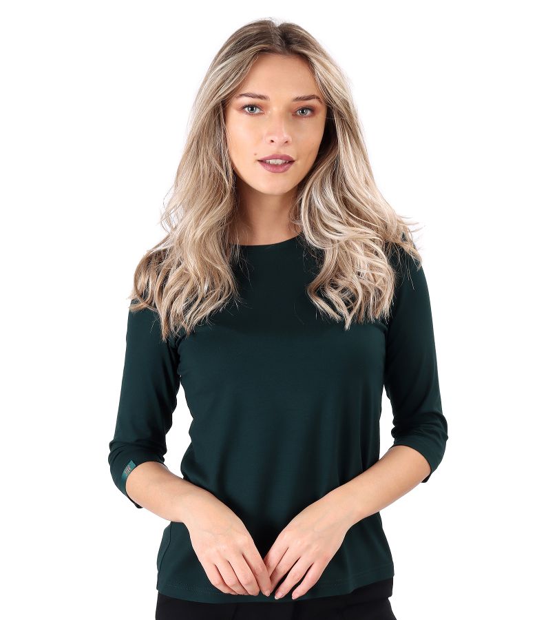 Elastic jersey blouse with rips at the decolletage and sleeve