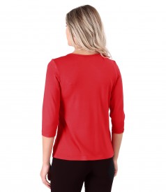 Elastic jersey blouse with rips at the decolletage and sleeve