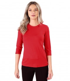 Elastic jersey blouse with rips at the decolletage and sleeve