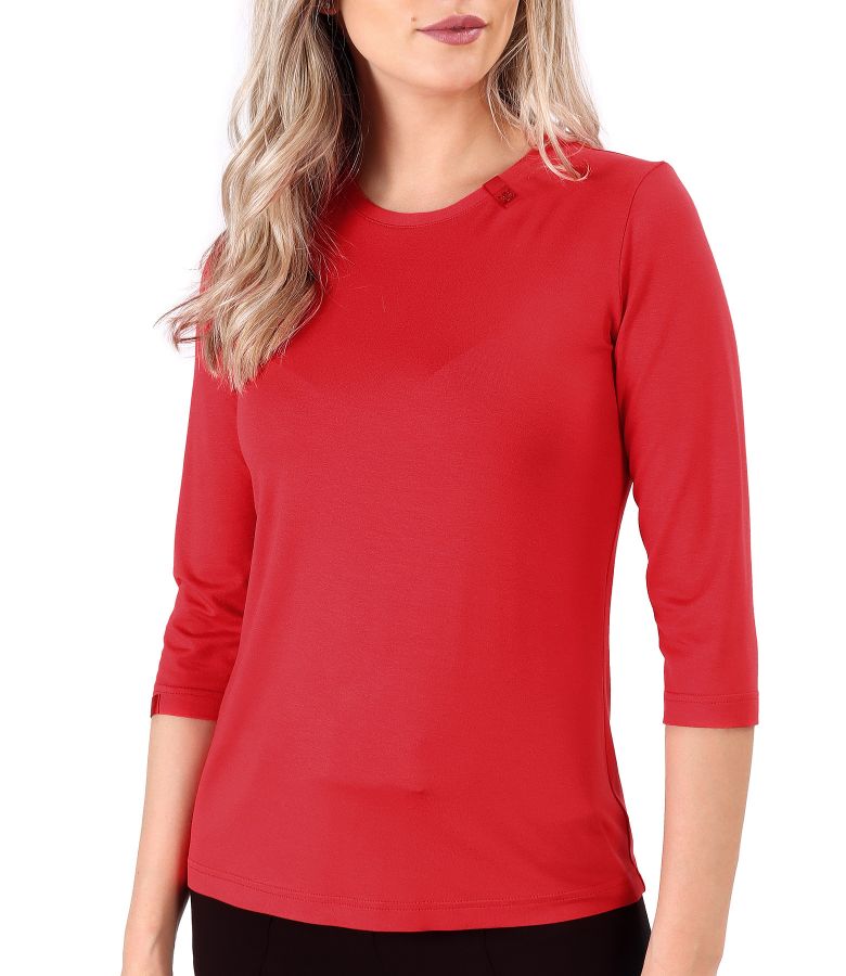 Elastic jersey blouse with rips at the decolletage and sleeve