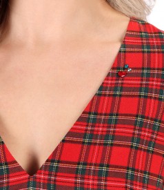 Checkered midi dress with crystals on the decolletage