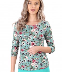 Elastic jersey blouse printed with floral motifs