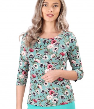 Elastic jersey blouse printed with floral motifs