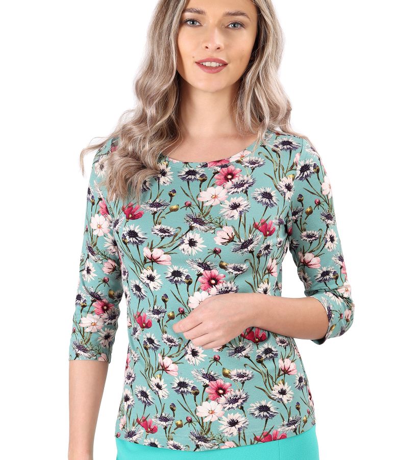 Elastic jersey blouse printed with floral motifs