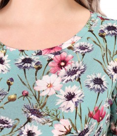 Elastic jersey blouse printed with floral motifs