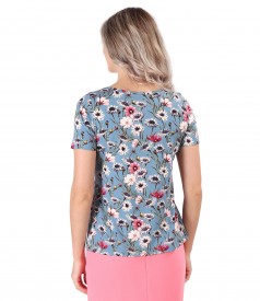 Elastic jersey blouse printed with floral motifs