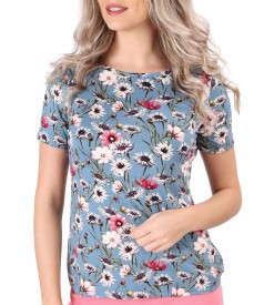 Elastic jersey blouse printed with floral motifs