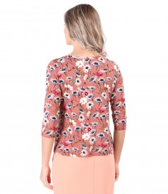 Elastic jersey blouse printed with floral motifs