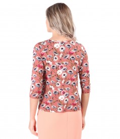 Elastic jersey blouse printed with floral motifs