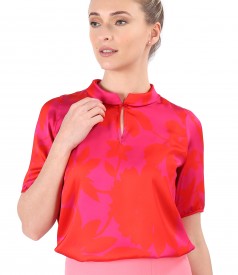 Satin blouse printed with floral motifs