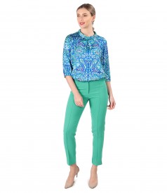 Elegant outfit with printed satin blouse and ankle pants