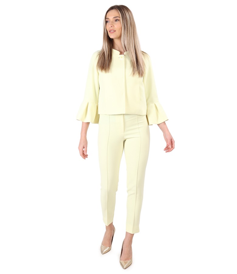 Office woman suit with jacket with wide cuffs and ankle pants