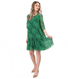 Dress with ruffles made of printed veil with floral motifs