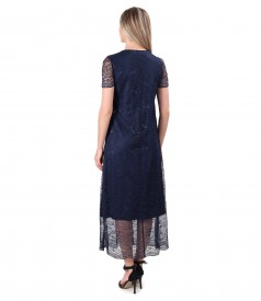 Lace dress with brooch at the neckline