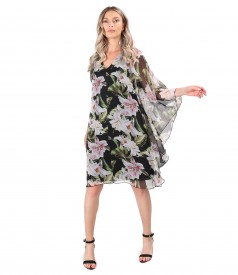 Butterfly dress made of printed veil with floral motifs