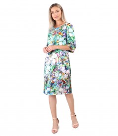 Elegant and casual satin dress with floral motifs