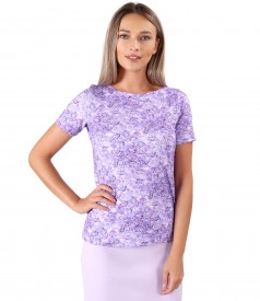 Elastic jersey blouse printed with floral motifs