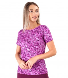 Elastic jersey blouse printed with floral motifs