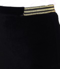 Velvet tapered skirt with gold elastic at the waist