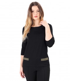 Fine elastic jersey blouse with gold elastic at the waist