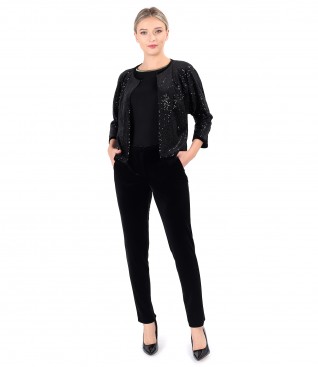 Elegant outfit with sequin bolero and elastic velvet pants