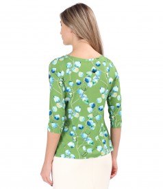 Elastic jersey blouse printed with floral motifs