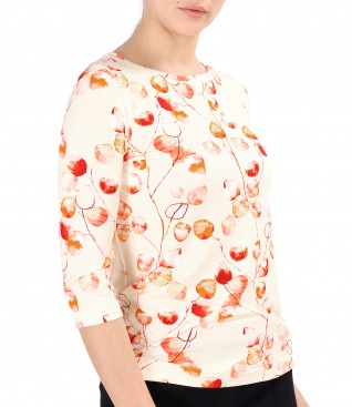 Elastic jersey blouse printed with floral motifs