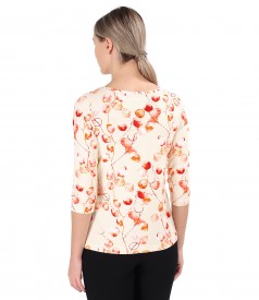 Elastic jersey blouse printed with floral motifs