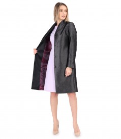 Elegant outfit with glossy fabric overcoat and flared dress