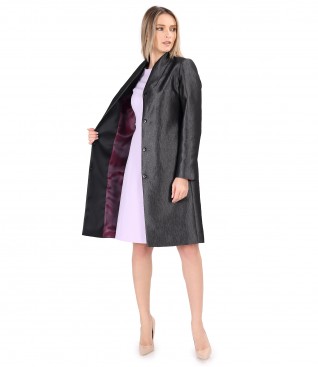 Elegant outfit with glossy fabric overcoat and flared dress