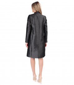 Elegant outfit with glossy fabric overcoat and flared dress