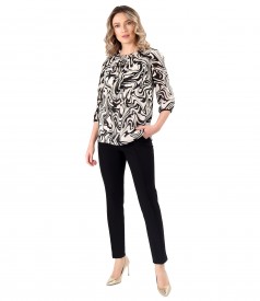 Elegant outfit with pants and a light blouse made of printed viscose