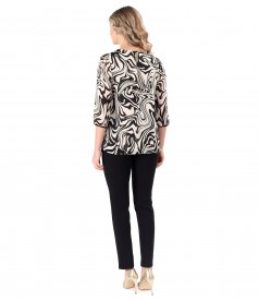 Elegant outfit with pants and a light blouse made of printed viscose