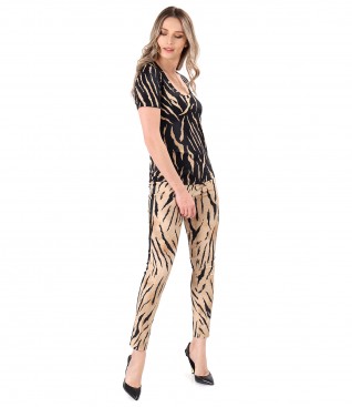 Elegant outfit with blouse and pants with animal print