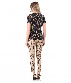 Elegant outfit with blouse and pants with animal print