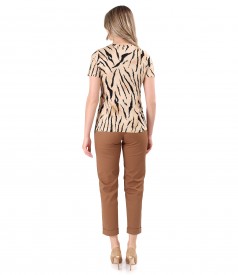 Elegant outfit with animal print blouse and cotton pants