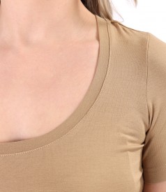 Elastic jersey blouse with rips band at the waist