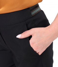 Elastic cotton pants with front pockets