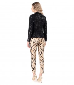 Occasion outfit with sequin jacket and animal print pants