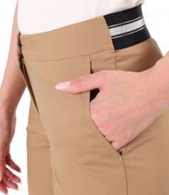 Elastic cotton pants with front pockets