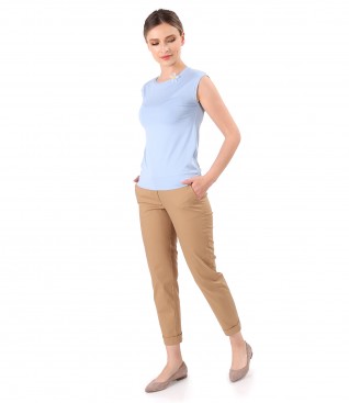 Casual outfit with cotton pants and jersey blouse with a bow at the neckline