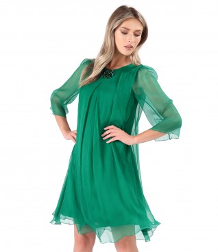 Natural silk veil dress with brooch at the neckline