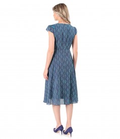 Elegant dress made of cotton veil printed with floral motifs