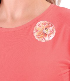 Elastic jersey blouse with decorative element on the shoulder